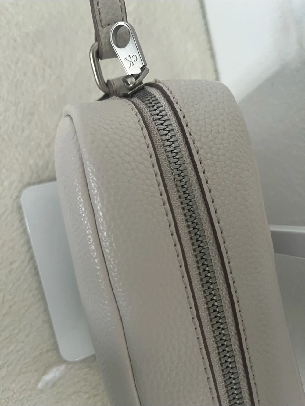 Calvin Klein Pebbled Crossbody Bag in Light Taupe